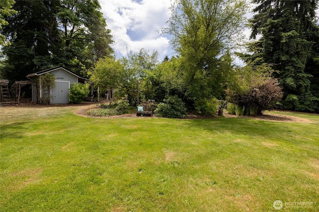 16325 Tareyton Ln SE, Yelm, WA 98597 - view of green lawn featuring a storage shed