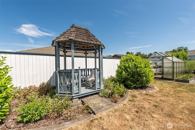 516 E Willow St, Sequim, WA 98382 - view of yard featuring a gazebo, a greenhouse, and an outdoor structure