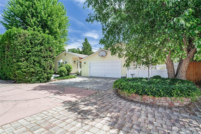 87 N Mary Ave, East Wenatchee, WA 98802 - view of front of property featuring concrete driveway and an attached garage