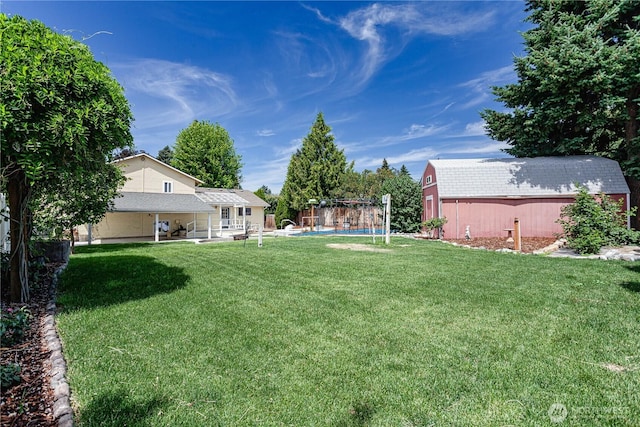 87 N Mary Ave, East Wenatchee, WA 98802 - view of green lawn featuring a patio area and a shed