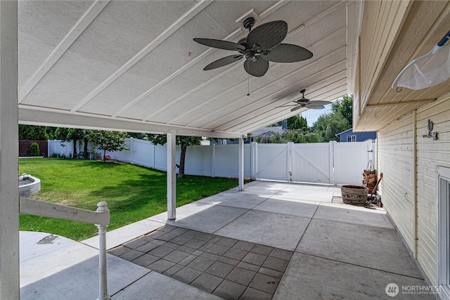 87 N Mary Ave, East Wenatchee, WA 98802 - fenced backyard featuring a gate, a patio, and a ceiling fan