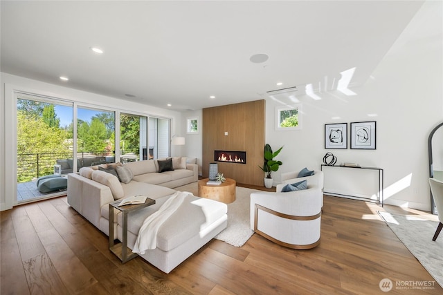 10204NE 43rd St, Kirkland, WA 98033 - living room with a fireplace, wood finished floors, and recessed lighting