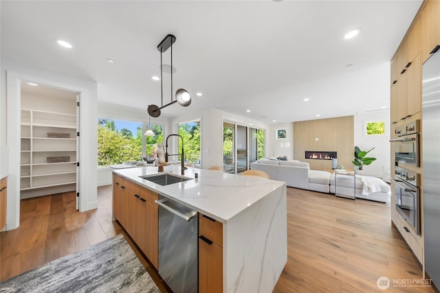 10204NE 43rd St, Kirkland, WA 98033 - kitchen featuring appliances with stainless steel finishes, modern cabinets, plenty of natural light, and recessed lighting