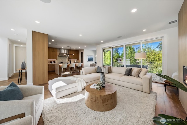 10204NE 43rd St, Kirkland, WA 98033 - living area with wood finished floors and recessed lighting