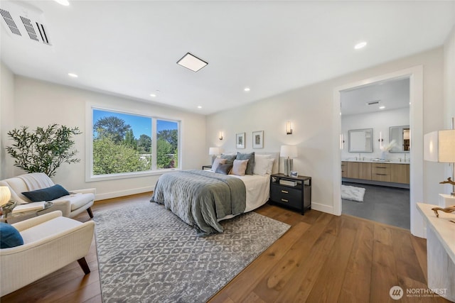 10204NE 43rd St, Kirkland, WA 98033 - bedroom featuring dark wood-type flooring, connected bathroom, and recessed lighting