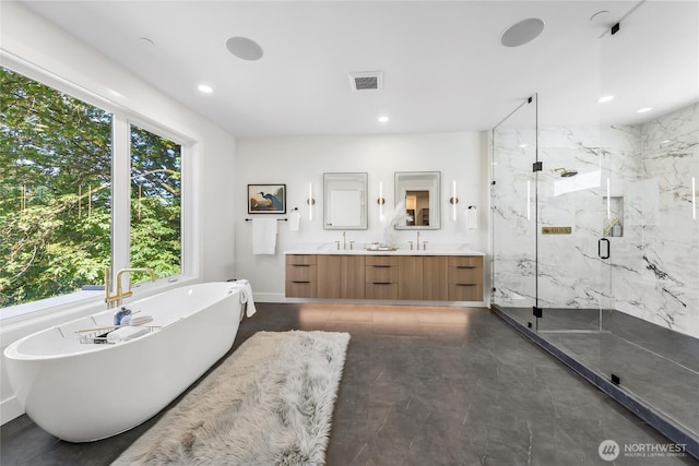 10204NE 43rd St, Kirkland, WA 98033 - full bath with a marble finish shower, a freestanding bath, double vanity, and recessed lighting