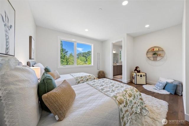 10204NE 43rd St, Kirkland, WA 98033 - bedroom with wood finished floors, recessed lighting, and ensuite bath