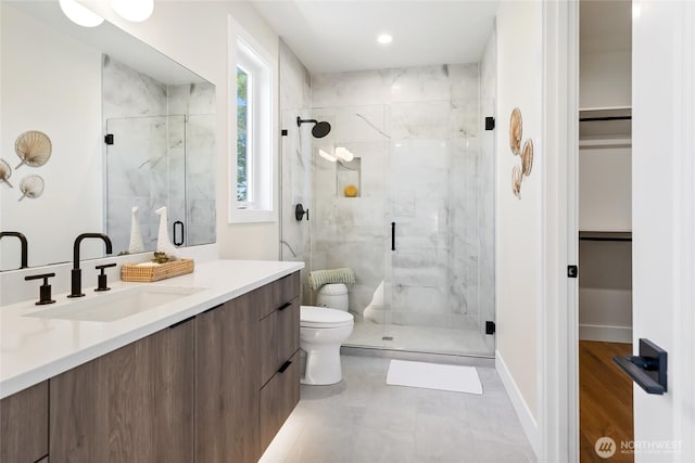 10204NE 43rd St, Kirkland, WA 98033 - bathroom with vanity, a marble finish shower, and a spacious closet