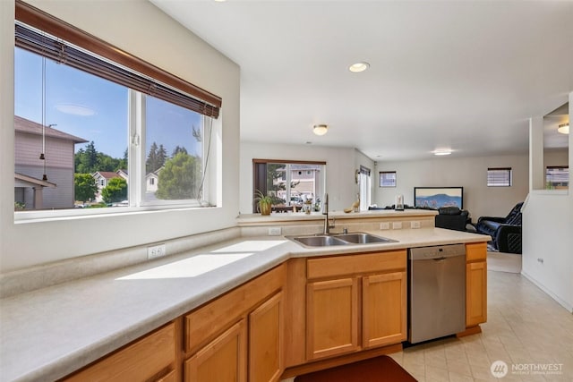 29709 217th Pl SE, Kent, WA 98042 - kitchen with stainless steel dishwasher, light countertops, open floor plan, a peninsula, and recessed lighting