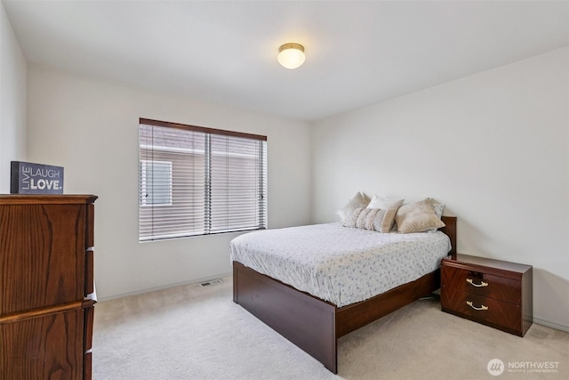 29709 217th Pl SE, Kent, WA 98042 - bedroom featuring light carpet and baseboards