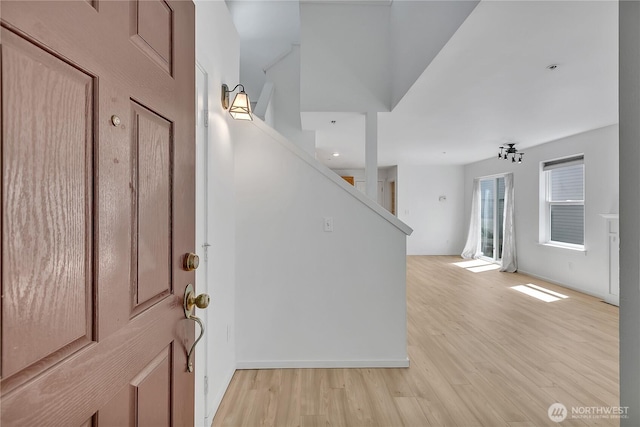 2064 Mcdonald Ave, Dupont, WA 98327 - entryway featuring light wood-type flooring and stairs