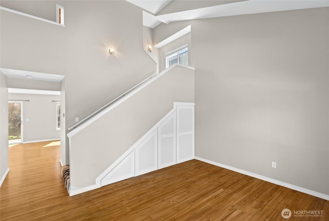 26822 27th Ave S, Kent, WA 98032 - stairs featuring wood finished floors and high vaulted ceiling