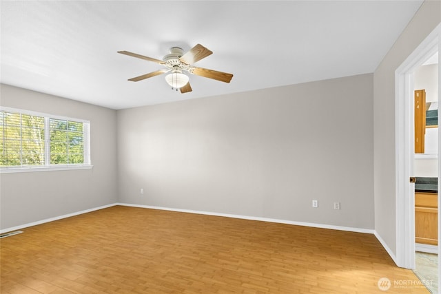 26822 27th Ave S, Kent, WA 98032 - empty room with light wood-style flooring and ceiling fan