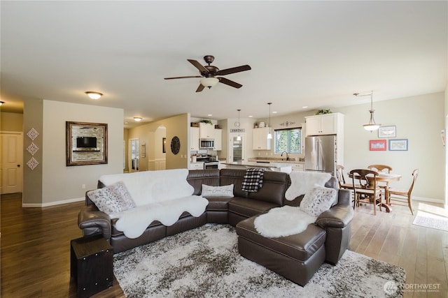 11928 Mayfair Ave SW, Port Orchard, WA 98367 - living area featuring ceiling fan and wood finished floors