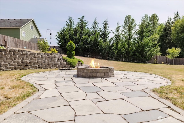 11928 Mayfair Ave SW, Port Orchard, WA 98367 - view of patio / terrace featuring an outdoor fire pit
