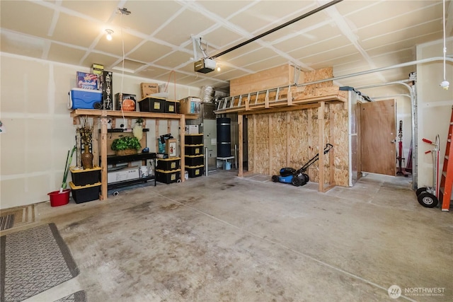 11928 Mayfair Ave SW, Port Orchard, WA 98367 - garage with a garage door opener and water heater