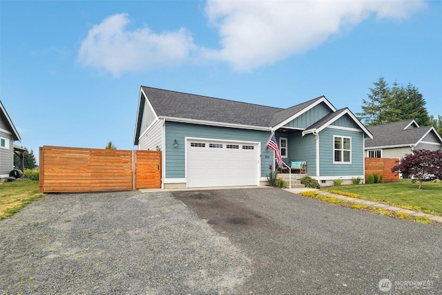 204 Regent Ct, Nooksack, WA 98276 - view of front facade featuring board and batten siding, a garage, and driveway