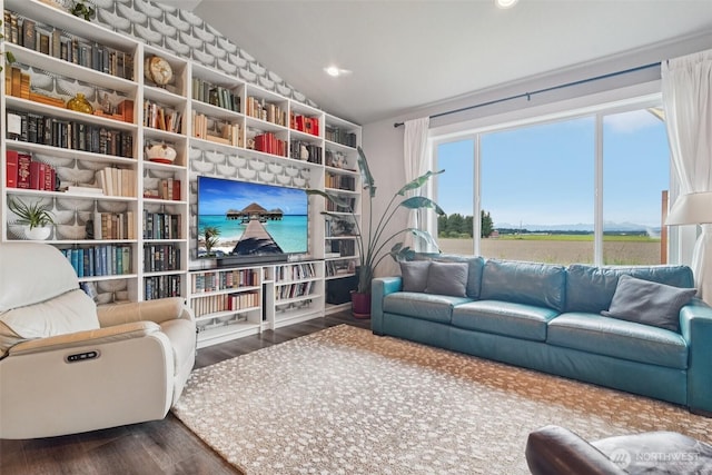204 Regent Ct, Nooksack, WA 98276 - living room featuring vaulted ceiling, wood finished floors, and recessed lighting