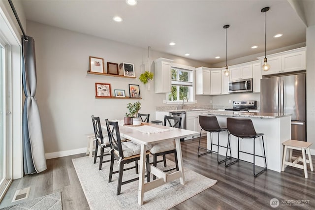 204 Regent Ct, Nooksack, WA 98276 - dining room featuring recessed lighting and dark wood finished floors