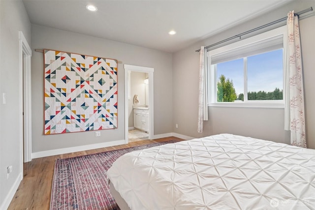 204 Regent Ct, Nooksack, WA 98276 - bedroom with wood finished floors, recessed lighting, and ensuite bath