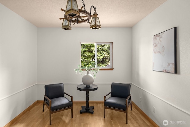13016 8th Pl SW, Burien, WA 98146 - sitting room featuring wood finished floors and a textured ceiling