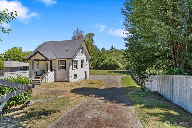 29260 Military Rd S, Federal Way, WA 98003 - view of front of home featuring asphalt driveway and roof with shingles