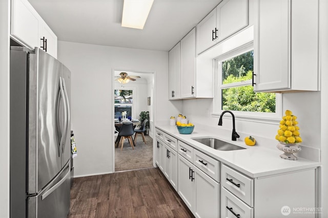 29260 Military Rd S, Federal Way, WA 98003 - kitchen featuring freestanding refrigerator, dark wood-style floors, light countertops, and white cabinetry