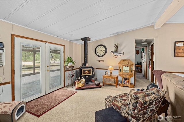 45019 Cougi Dr N, Davenport, WA 99122 - living area featuring french doors, carpet floors, and a wood stove