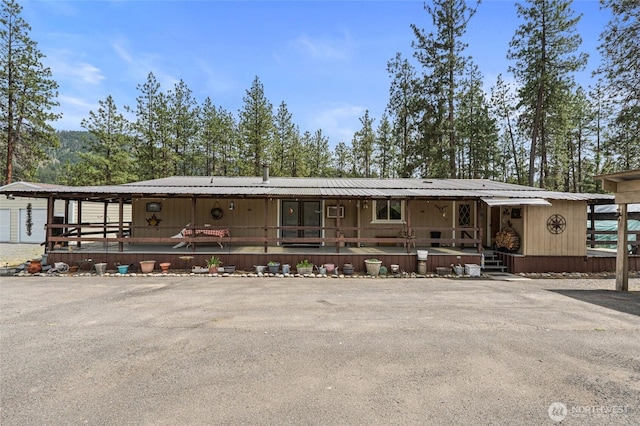 45019 Cougi Dr N, Davenport, WA 99122 - manufactured / mobile home with covered porch and a metal roof