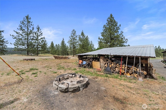 45019 Cougi Dr N, Davenport, WA 99122 - view of yard featuring an outdoor fire pit and an outbuilding