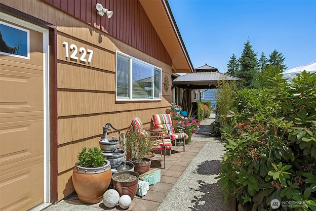 1227 137th St E, Tacoma, WA 98445 - view of patio / terrace with a gazebo