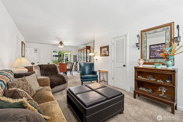 1227 137th St E, Tacoma, WA 98445 - living room with light colored carpet and ceiling fan