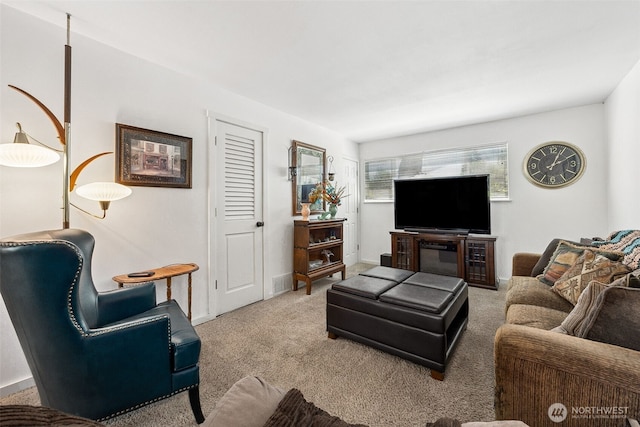 1227 137th St E, Tacoma, WA 98445 - carpeted living room featuring baseboards
