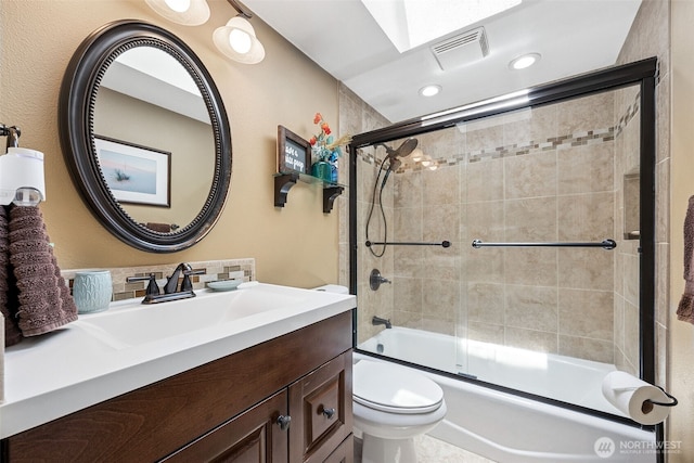 1227 137th St E, Tacoma, WA 98445 - full bath with shower / bath combination with glass door, vanity, and recessed lighting