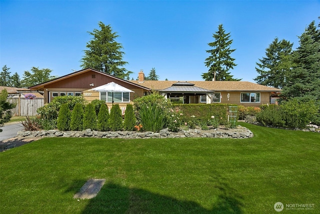 1227 137th St E, Tacoma, WA 98445 - ranch-style home with a chimney