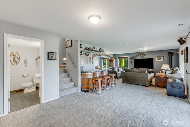 23017 138th Ave E, Graham, WA 98338 - carpeted living area with stairway and baseboards