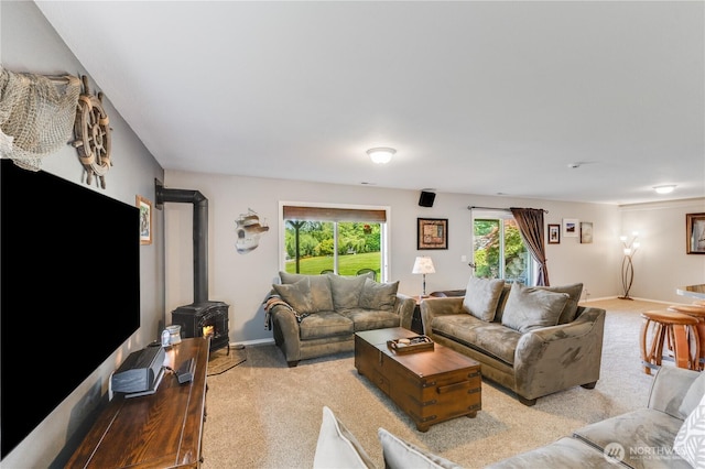 23017 138th Ave E, Graham, WA 98338 - living room with light colored carpet and a wood stove