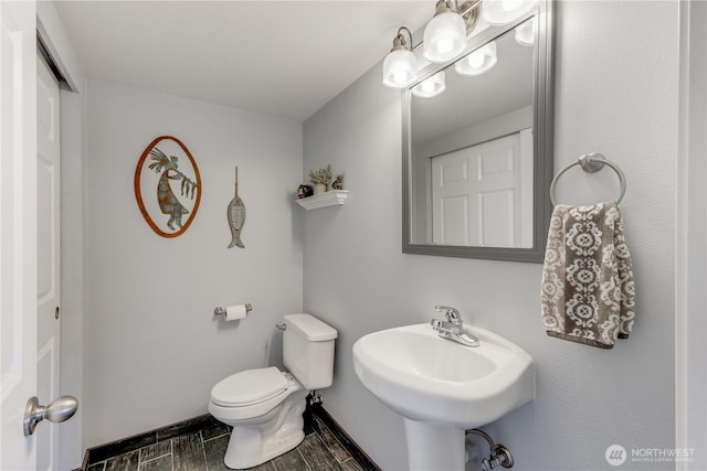 23017 138th Ave E, Graham, WA 98338 - bathroom featuring toilet and wood finish floors