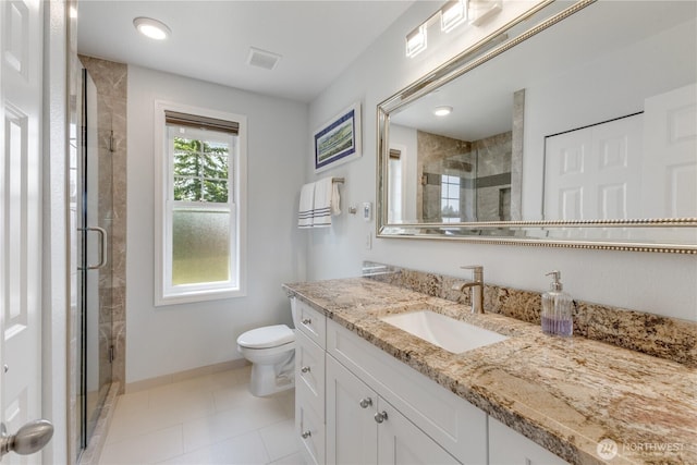 23017 138th Ave E, Graham, WA 98338 - bathroom with vanity, a stall shower, and tile patterned floors