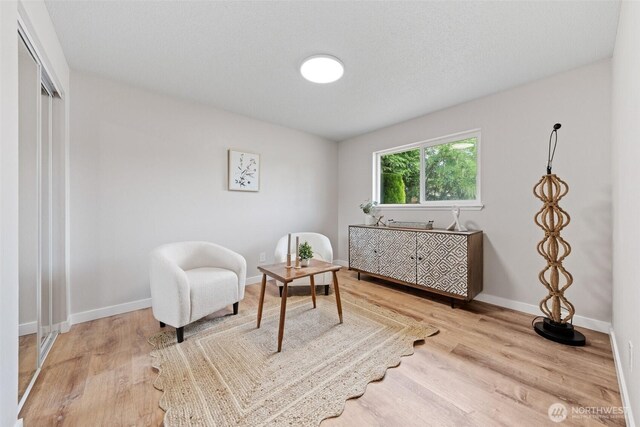 5257 N Dahl Dr, Tacoma, WA 98406 - living area featuring wood finished floors and baseboards