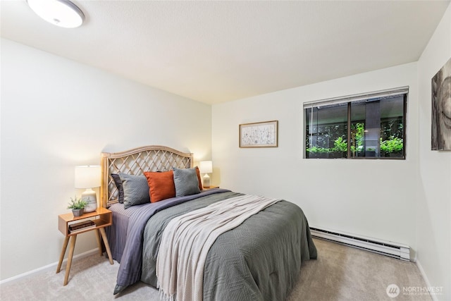150 Melrose Ave E Unit 105, Seattle, WA 98102 - carpeted bedroom with a baseboard heating unit and baseboards