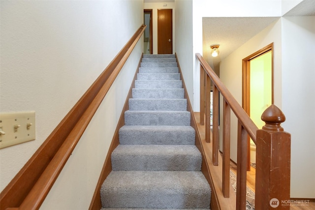 1264 SW Lanyard Loop Unit 2, Oak Harbor, WA 98277 - stairs with carpet floors