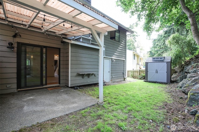 1264 SW Lanyard Loop Unit 2, Oak Harbor, WA 98277 - view of yard featuring a storage shed and a patio area