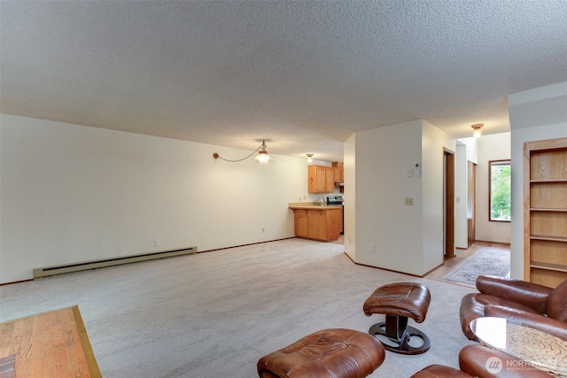 1264 SW Lanyard Loop Unit 2, Oak Harbor, WA 98277 - living room with a baseboard radiator, light colored carpet, and a textured ceiling