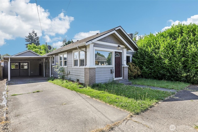 1004 S 5th Ave, Kelso, WA 98626 - view of front of property featuring concrete driveway, entry steps, and a carport