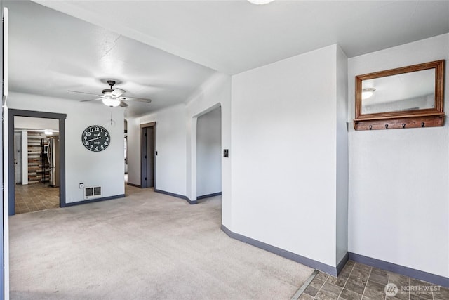 1004 S 5th Ave, Kelso, WA 98626 - carpeted empty room featuring baseboards and ceiling fan