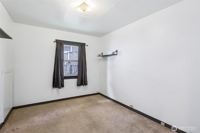 1004 S 5th Ave, Kelso, WA 98626 - carpeted spare room with baseboards