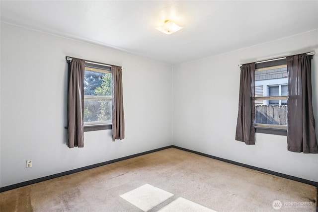 1004 S 5th Ave, Kelso, WA 98626 - carpeted spare room featuring baseboards
