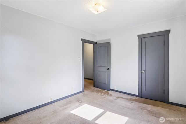 1004 S 5th Ave, Kelso, WA 98626 - unfurnished bedroom featuring carpet floors and baseboards