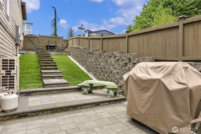 2015 79th St SE, Everett, WA 98203 - fenced backyard with area for grilling and a patio